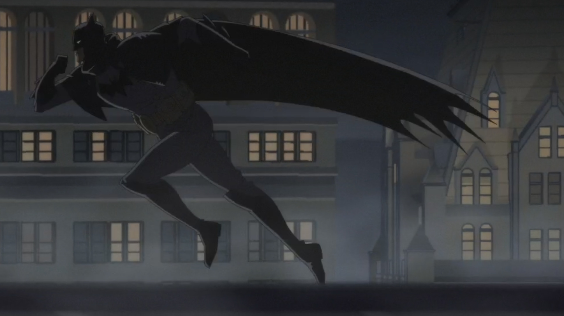 Batman running across the roof reminiscent of Batman The Animated Series