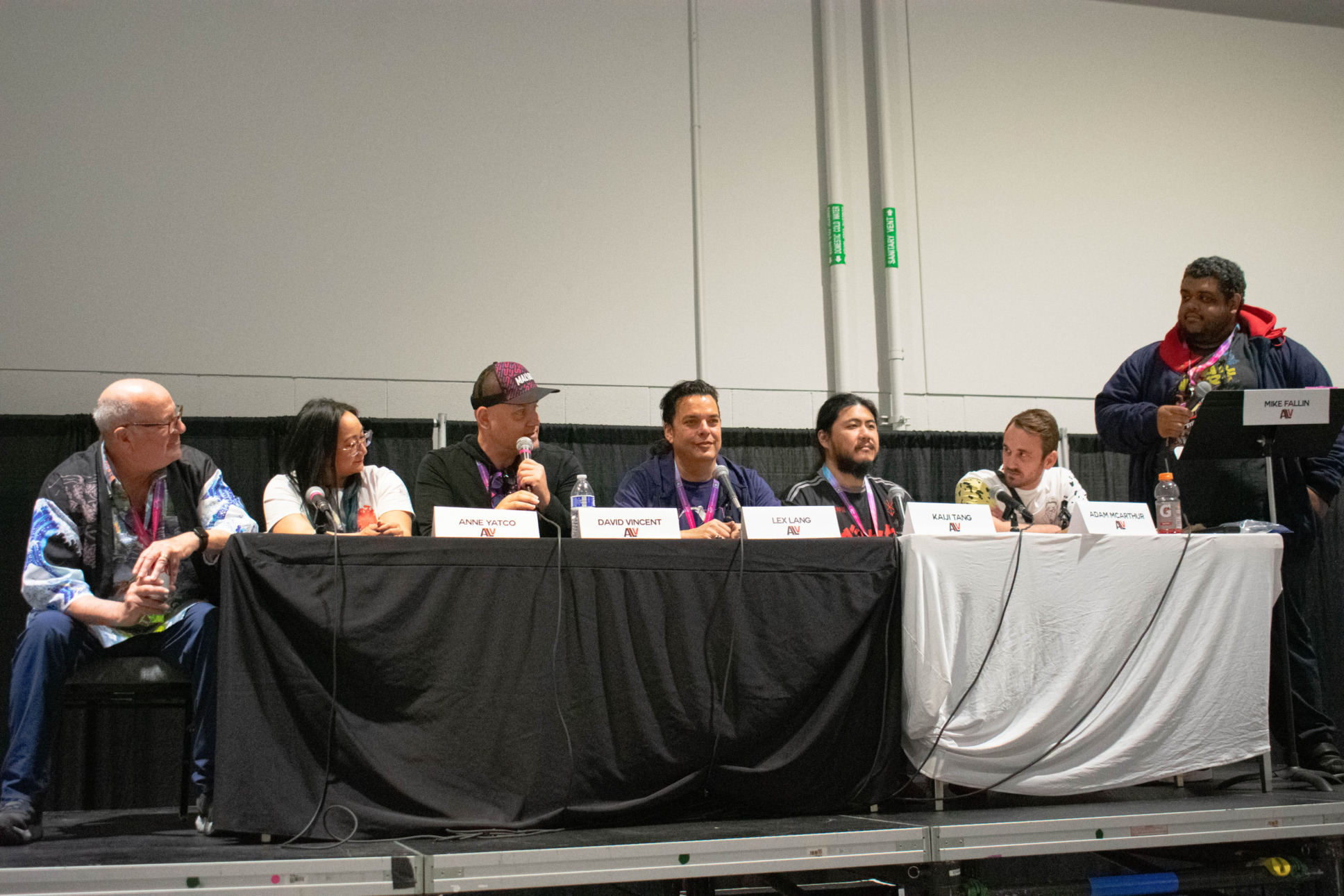 Left to right: Michael Sorich, Anne Yatco, David Vincent, Lex Lang, Kaiji Tang, Adam McArthur, and panel moderator Mike Fallin