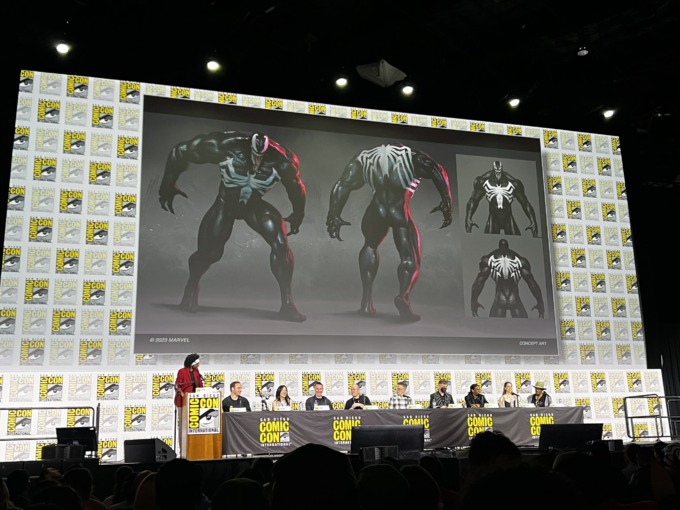 A look at some concept art for Venom- a ginormous creature, human-shaped but seemingly made up of a black gooey substance. A white spider symbol similar to Peter Parker's Spider-Man's suit is on his chest and back.