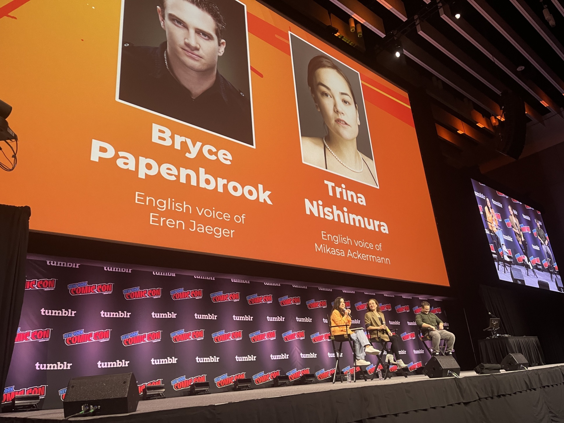 Bryce Papenbrook and Trina Nishimura at the Attack on Titan panel at NYCC