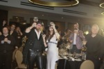 picture of people toasting in a ballroom