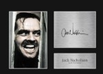 A framed photo of Jack Nicholson in The Shining, his signature and a silver plaque