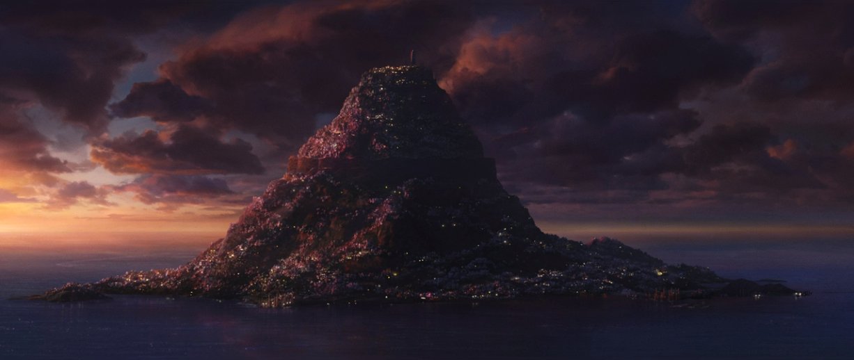 The island on Pabu at dusk. The sky is cloudy with few rays of light shining through.