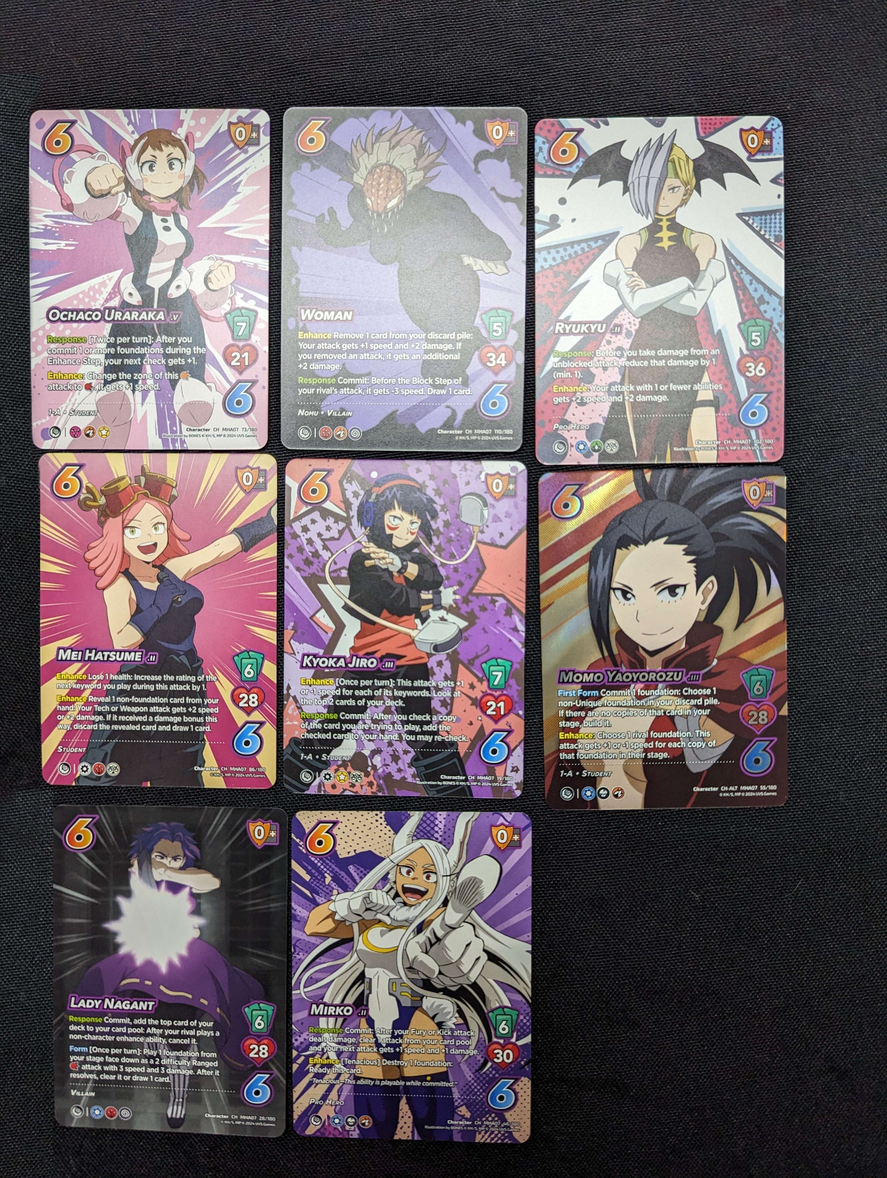 Cards from the UniVersus “My Hero Academia: Girl Power” series, illustrating main characters from the anime. Featuring action and character cards.