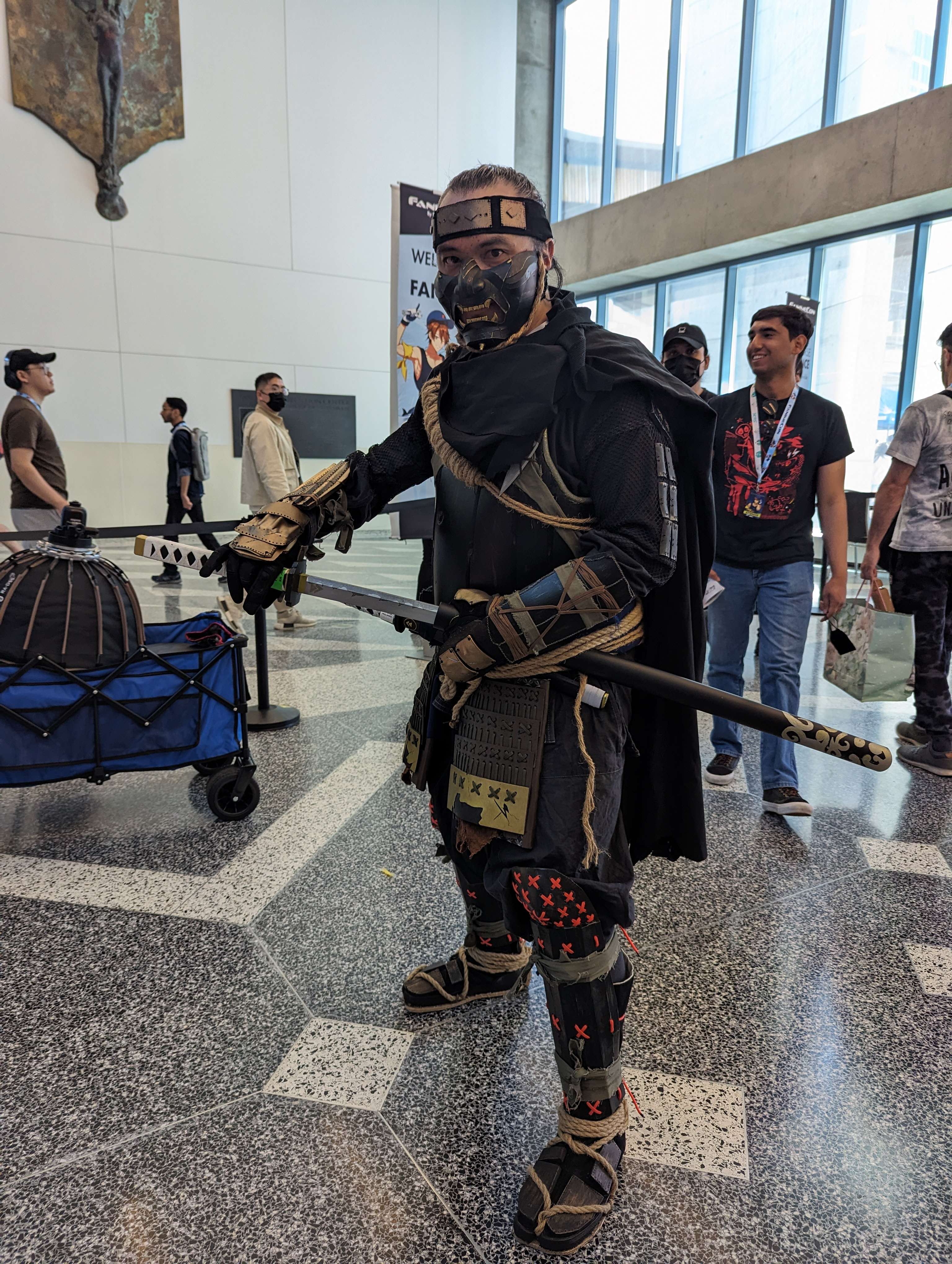 Cosplayer dressing up at Fanime inside the convention center