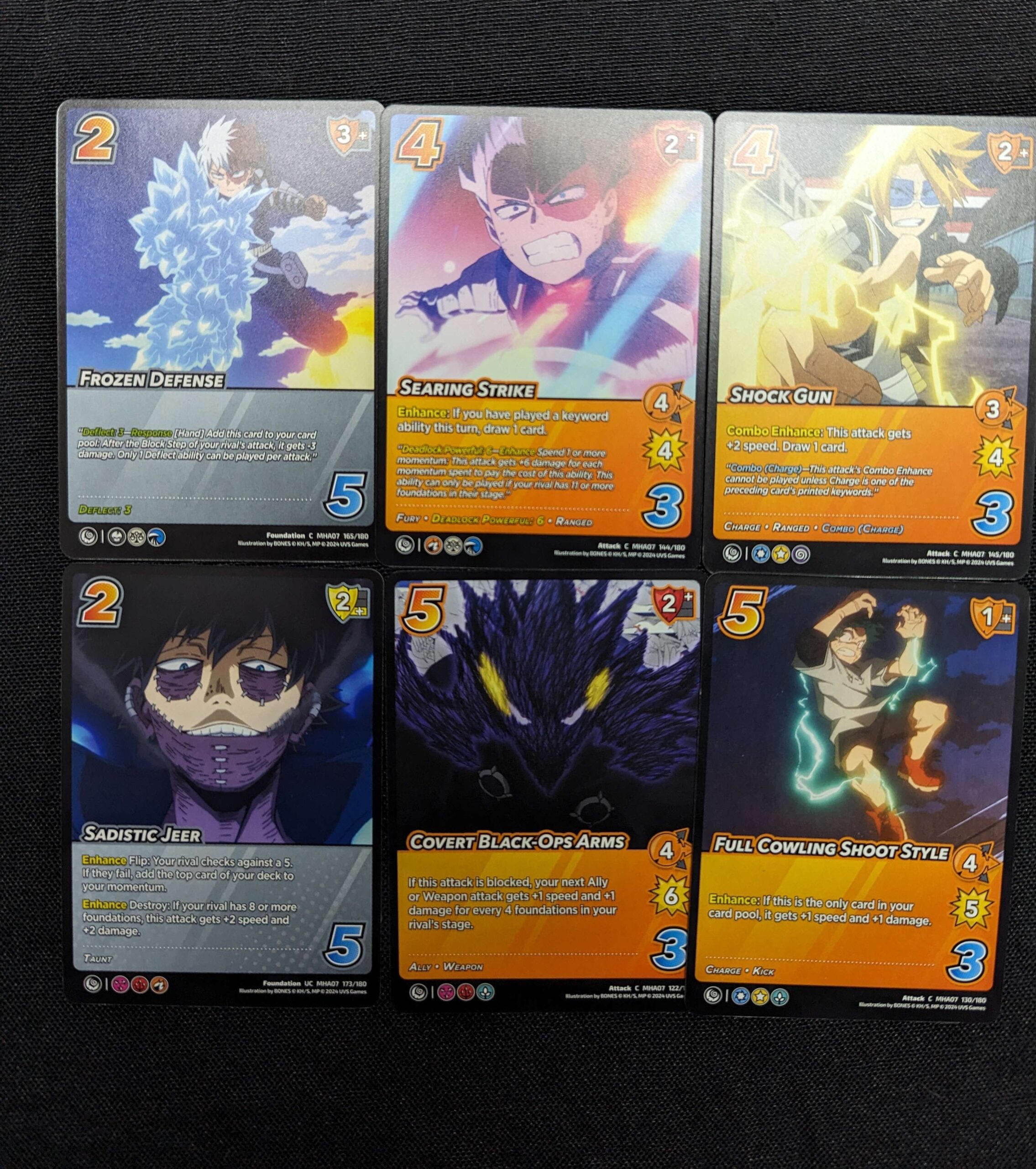 Cards from the UniVersus “My Hero Academia: Girl Power” series, illustrating main characters from the anime. Featuring action and character cards.