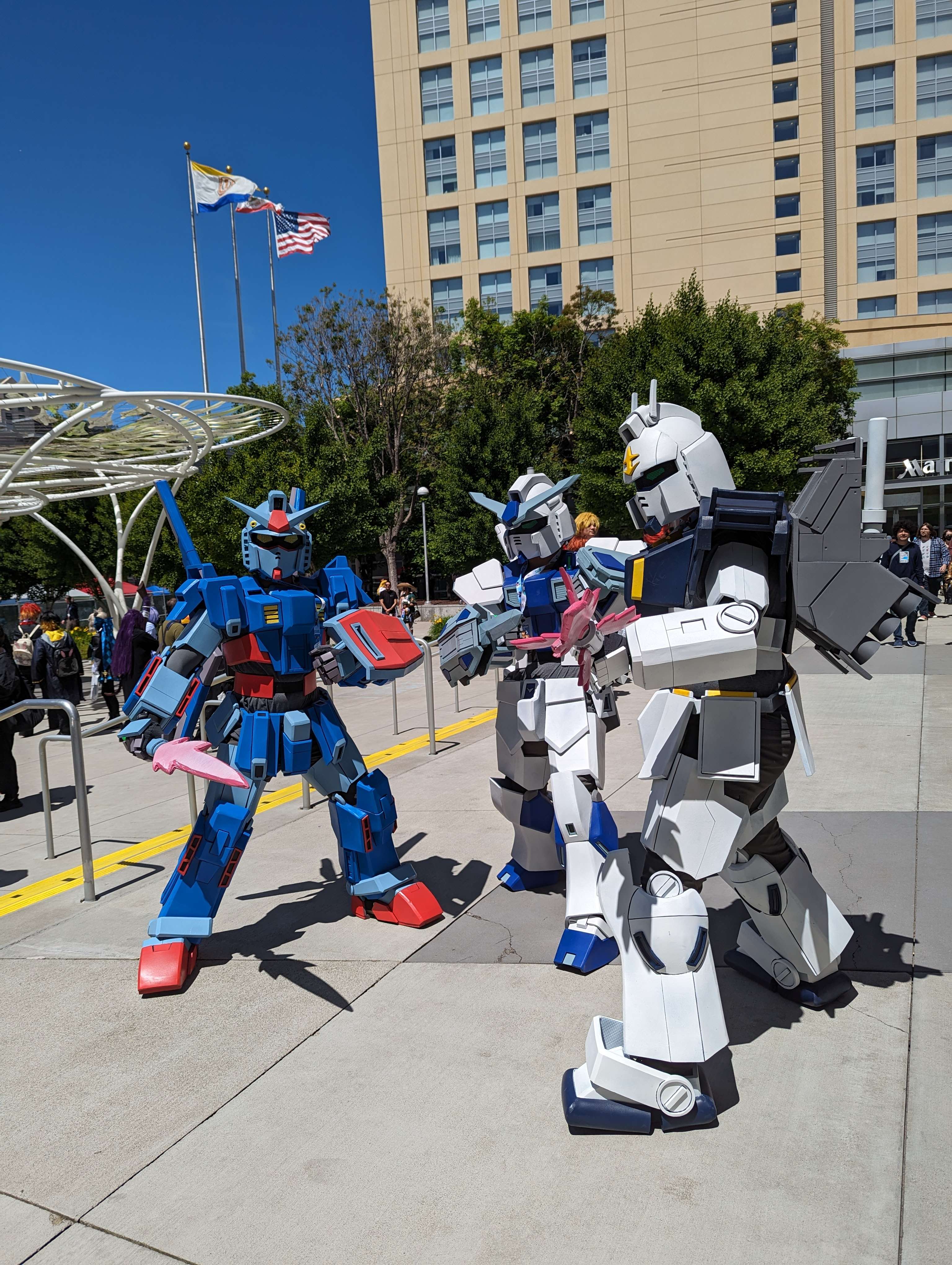 Cosplayers dressing up as Gundams at Fanime outside the convention center