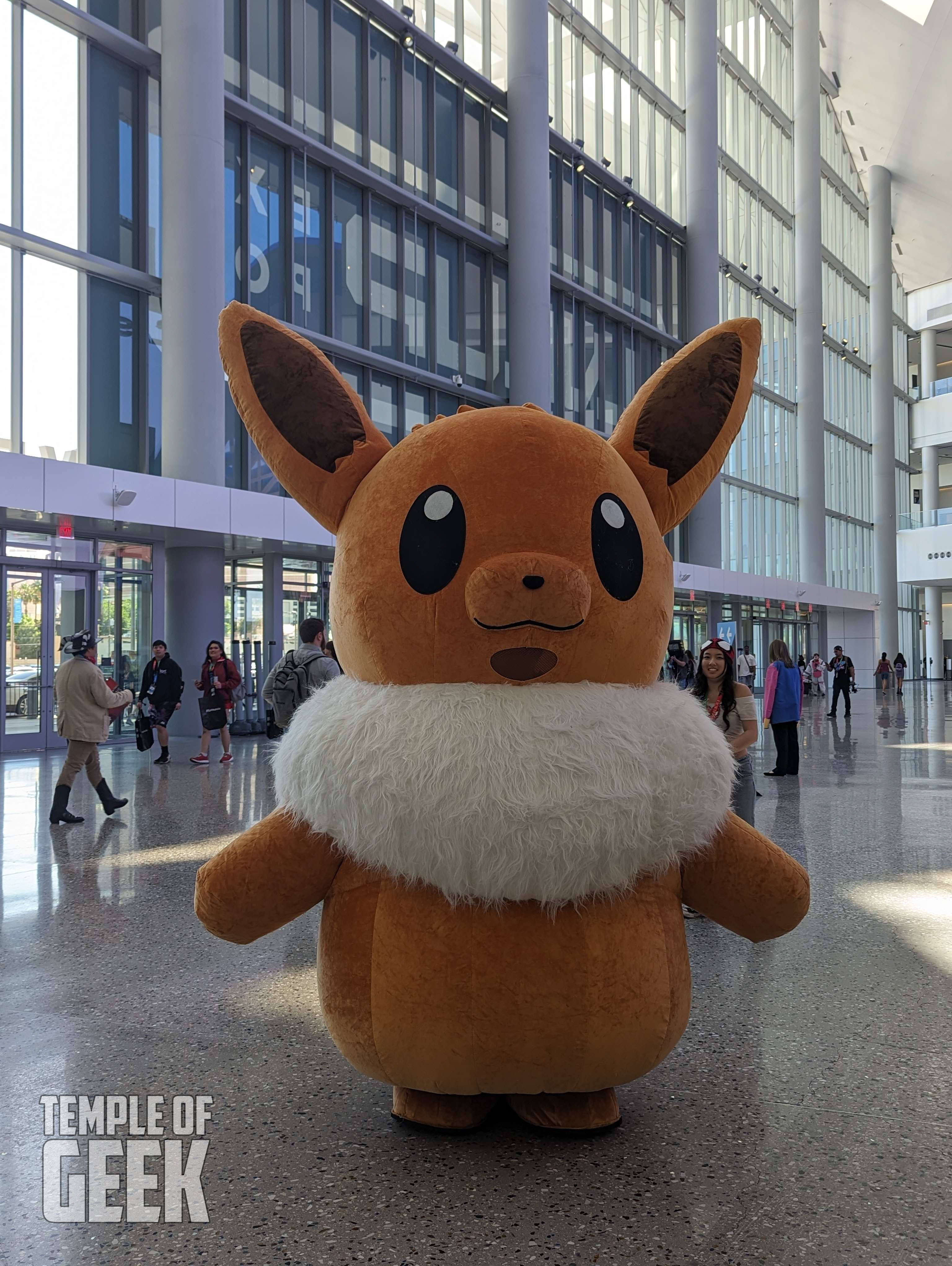 Cosplayer dressing up as a mascot eevee at LVL UP EXPO inside the convention center