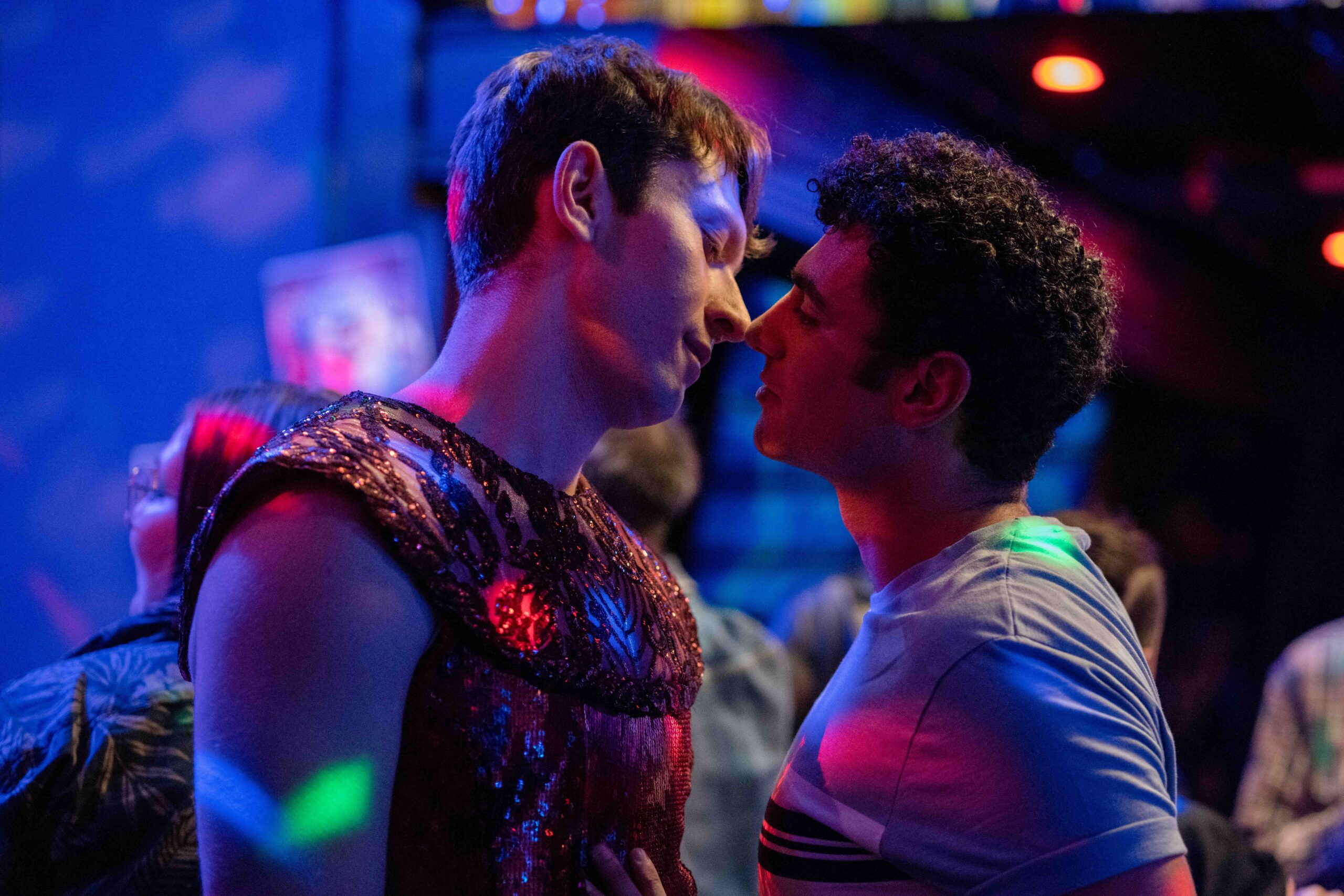 picture of two men dancing at a nightclub 