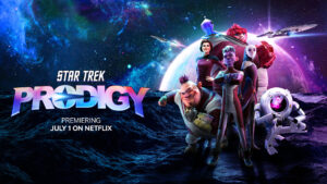 Star Trek: Prodigy Season 2 Key Art Poster featuring from Left to Right: Jankom Pog, Admiral Janeway, Murf sitting on top of Rok Tahk's shoulder, Dal, Gwyn, and Zero in the foreground of a planet. The starships The Protostar and the USS Voyager-A can be seen flying in opposite directions in the background