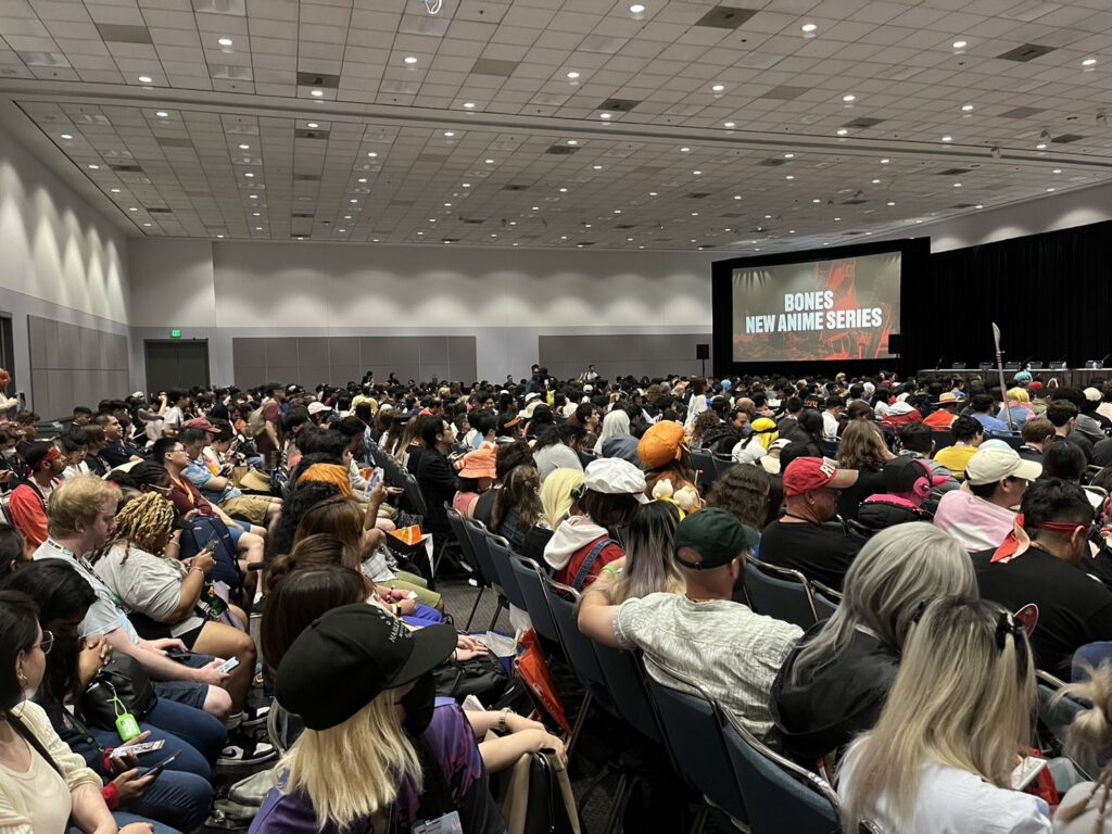 panel room is full of people for the studio bones reveal