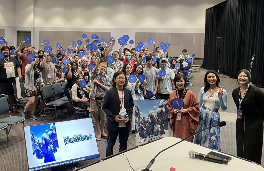 blue miburo producer and director pose with the panel room