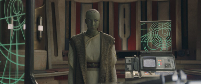 Vernestra Rwoh (Rebecca Henderson) stands at the Jedi Temple, surrounded by the technology of the Jedi Temple