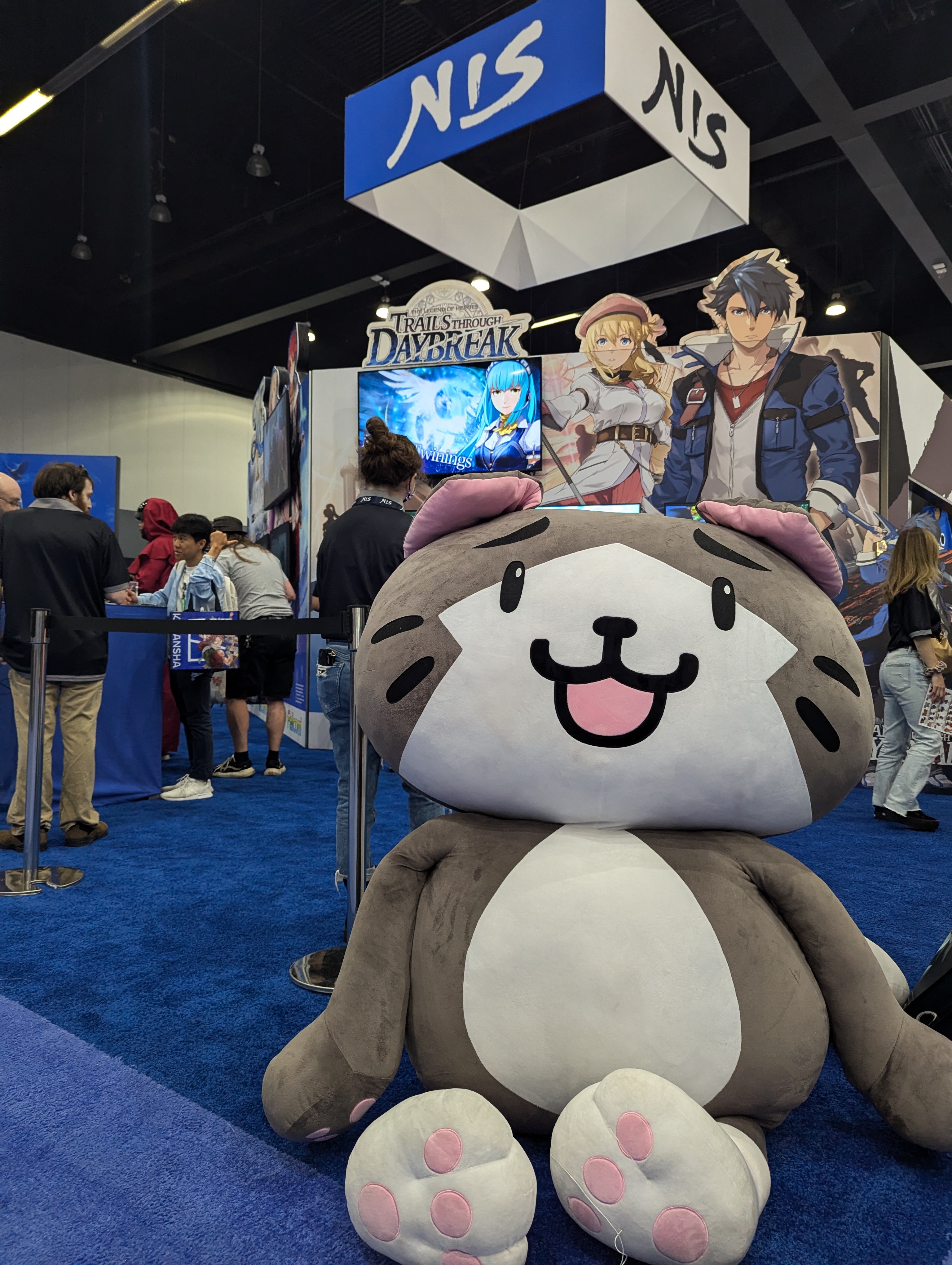 NIS booth with mascot