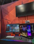 iBUYPOWER booth at Anime Expo displaying prebuilt gaming pcs, feat Y70 Touch System