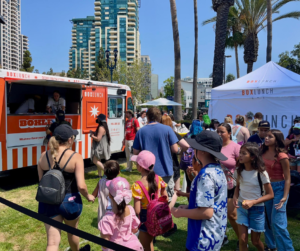 Fans line up for freebies at the BoxLunch truck