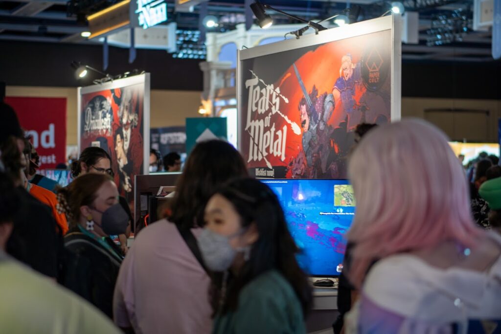 Exhibitor Hall for PAX West 2024 focused on Tears of Metal game booth