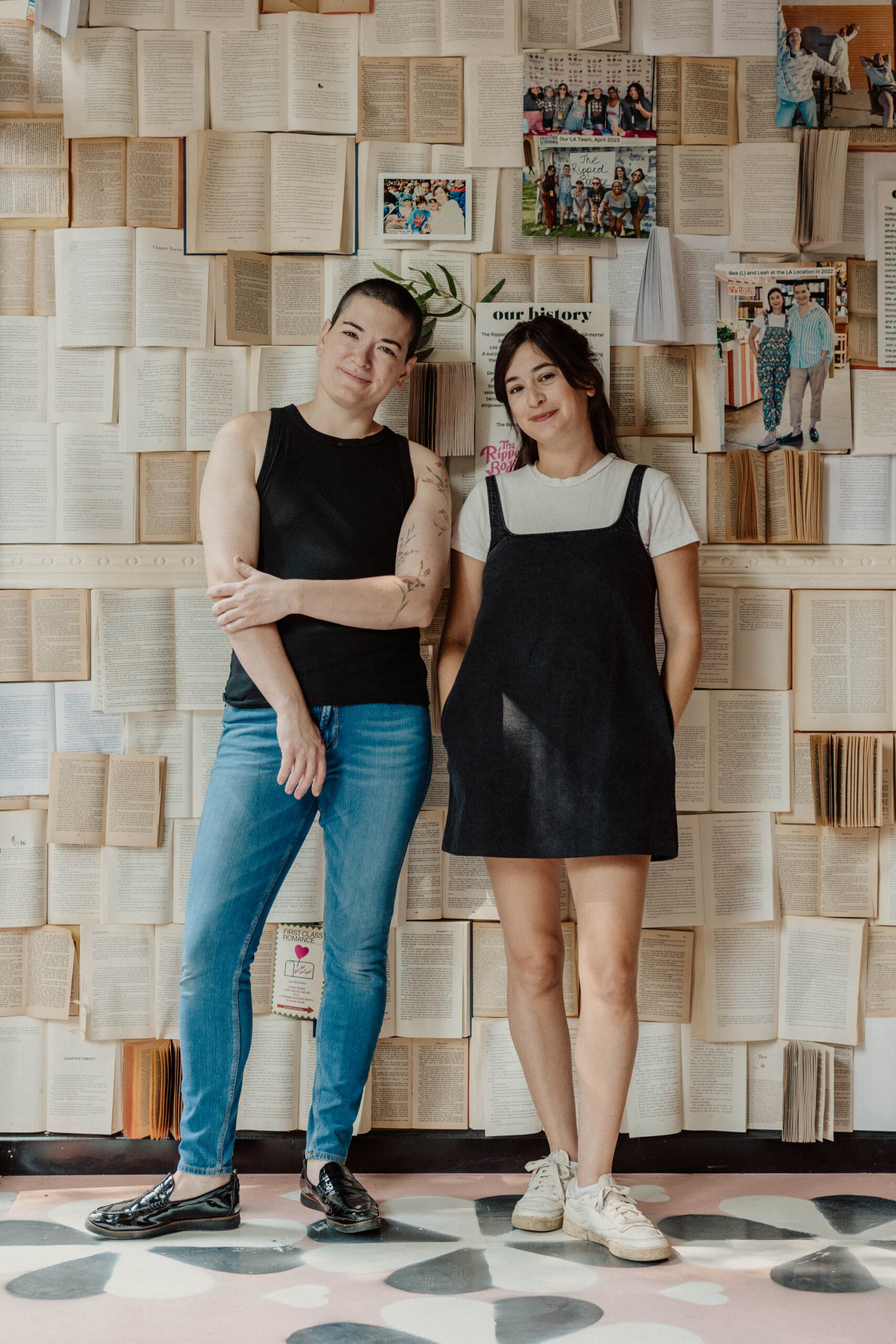 Leah and Bea Koch standing against a wall