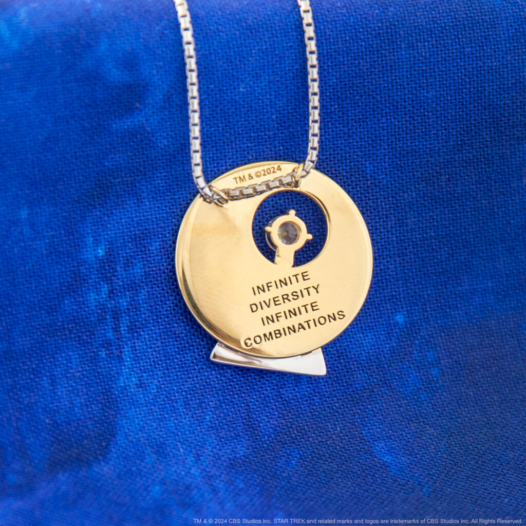 Star Trek: The Original Series IDIC pendant with quote "Infinite Diversity in Infinite Combinations" on reverse of pendant