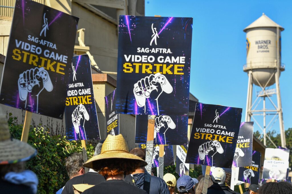 VIdeo Game SAG AFTRA strikers with Signs