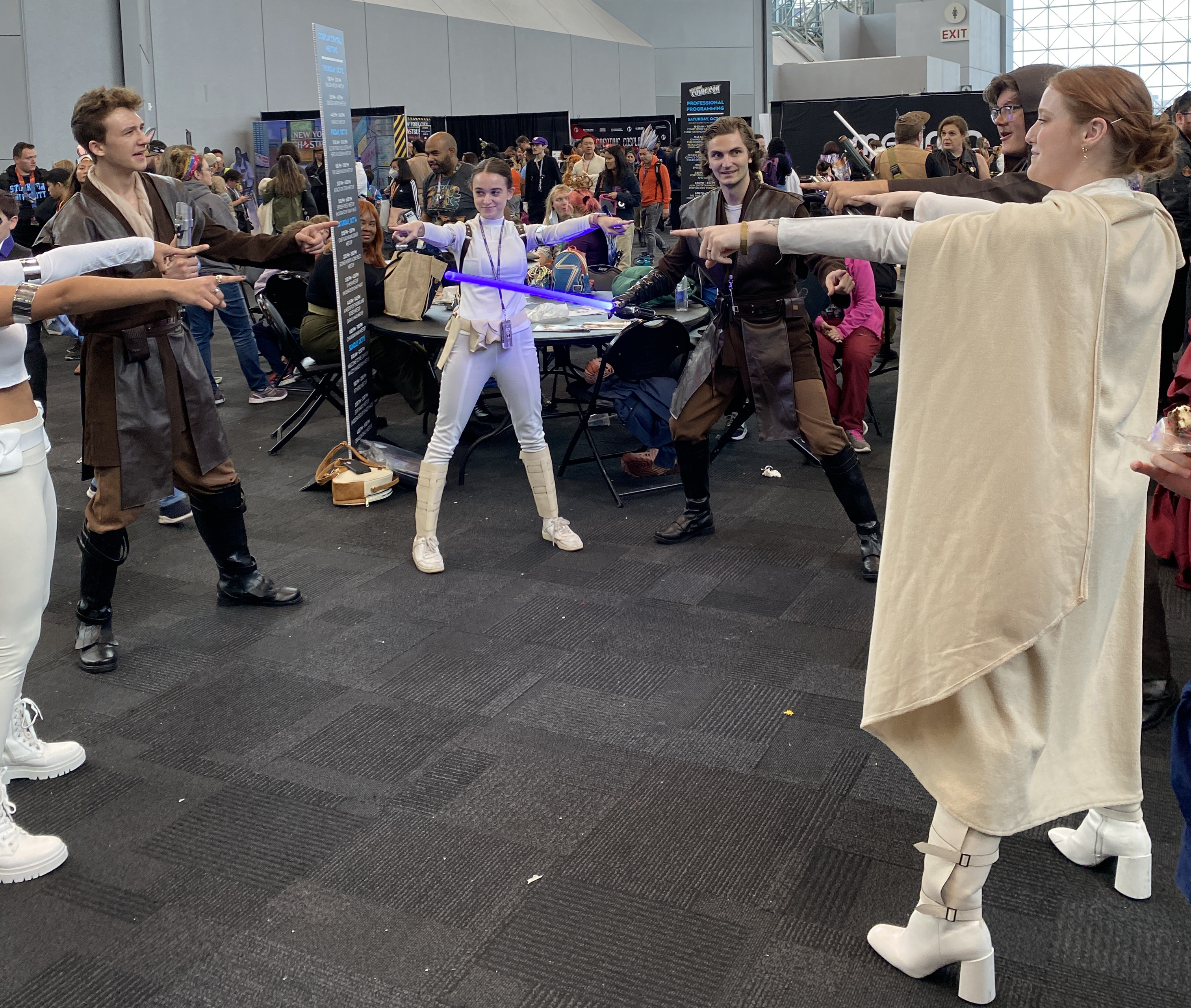 Anakin and Padme Amidala cosplayers re-create the "Spider-Man pointing" meme at NYCC 2023