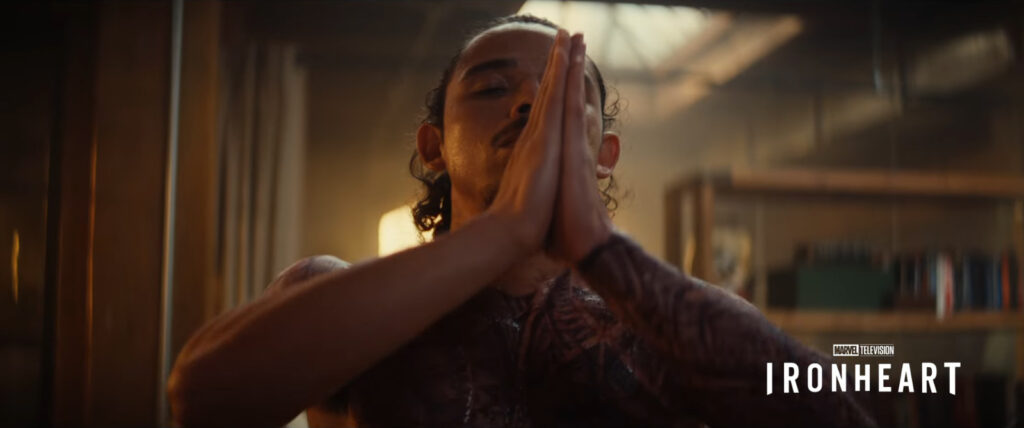 The Hood meditates with his eyes closed and palms pressed together- and with his shirt off. Screenshot from the Disney+ Marvel 2025 "Look Ahead" trailer.