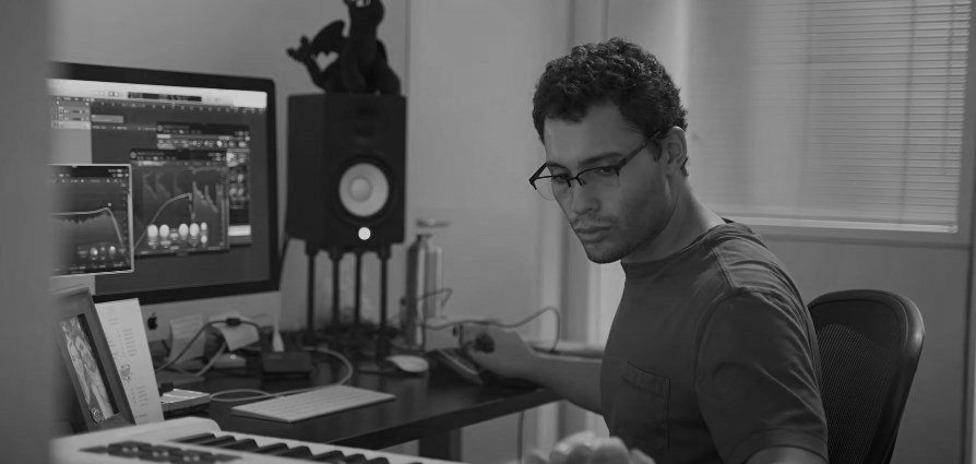 Robert Arzola working on his computer for music