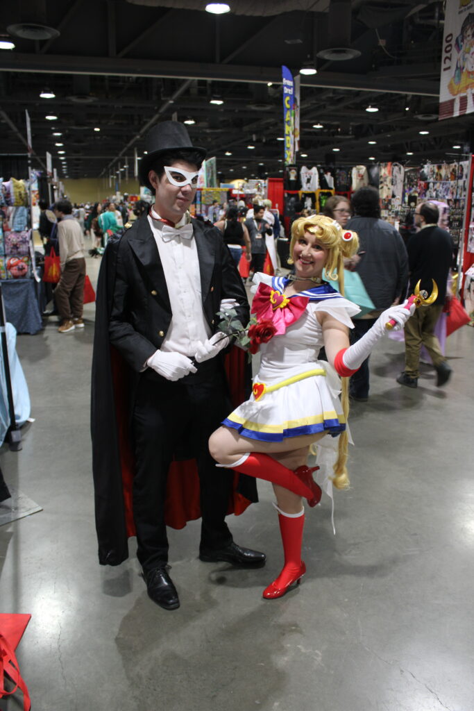 Sailor Moon and Tuxedo Mask posing together 