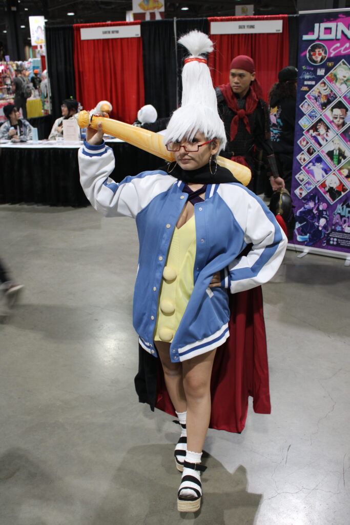 Seiko Ayase posing with a baseball bat