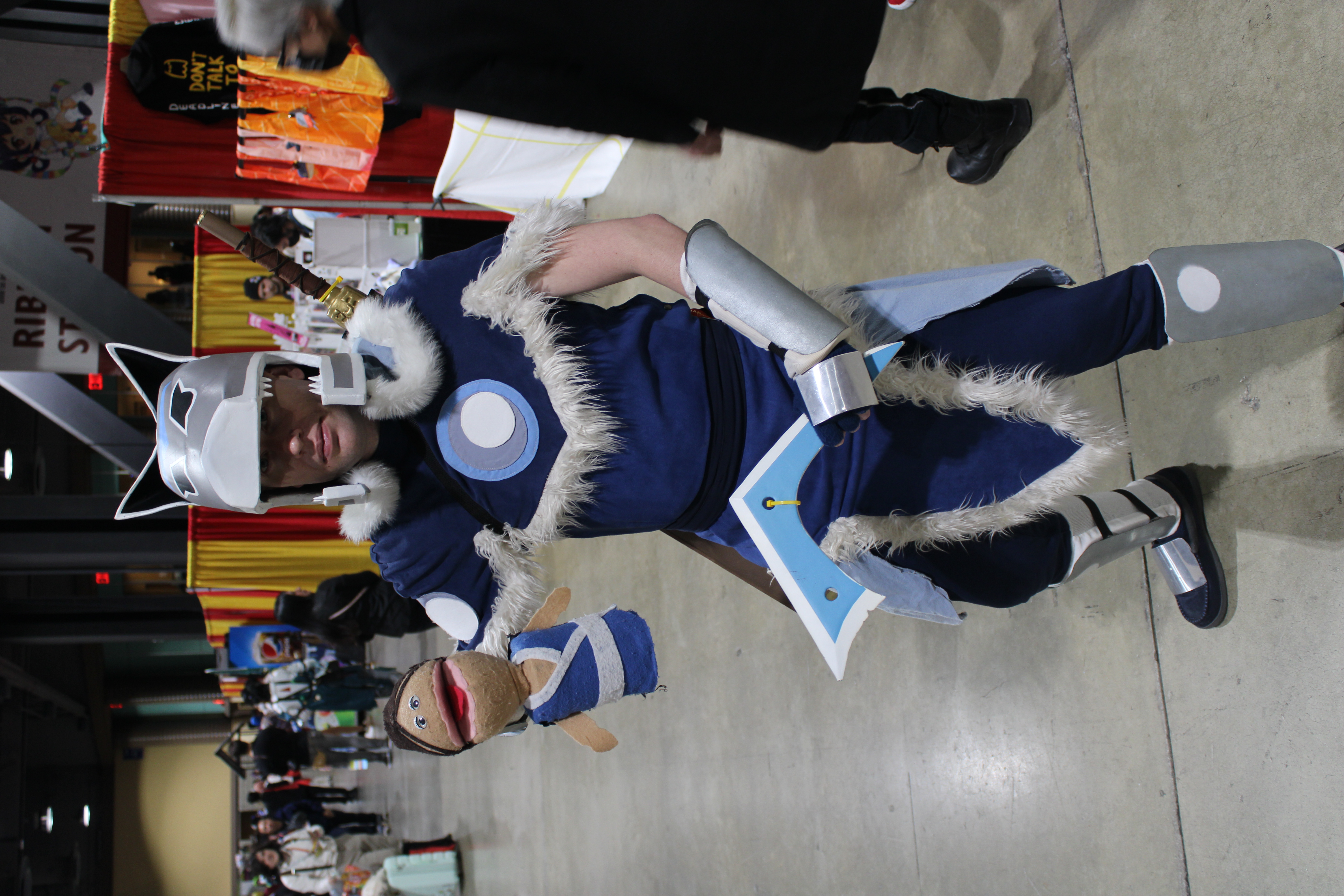 Sokka playing with a hand puppet 