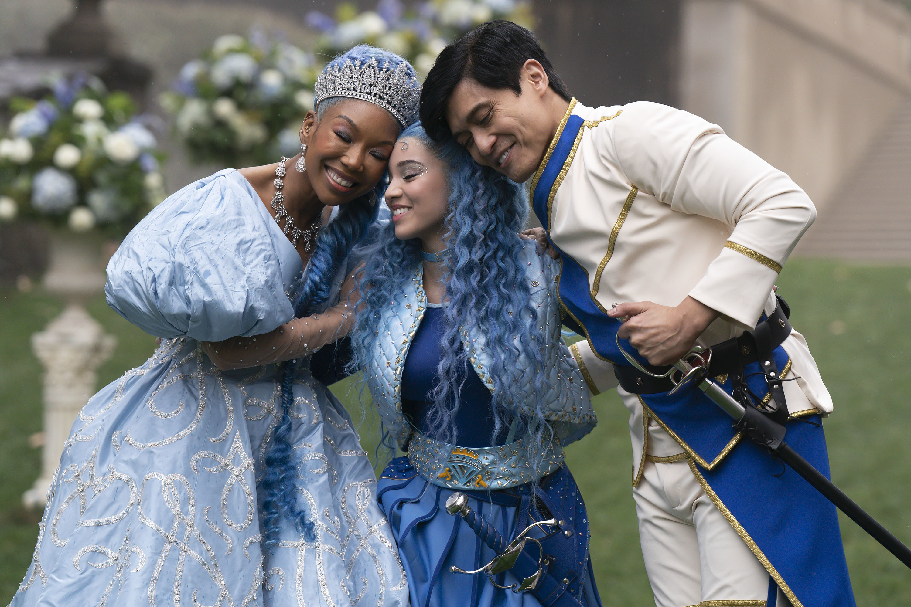 Cinderella, Chloe and King Charming share a family hug.