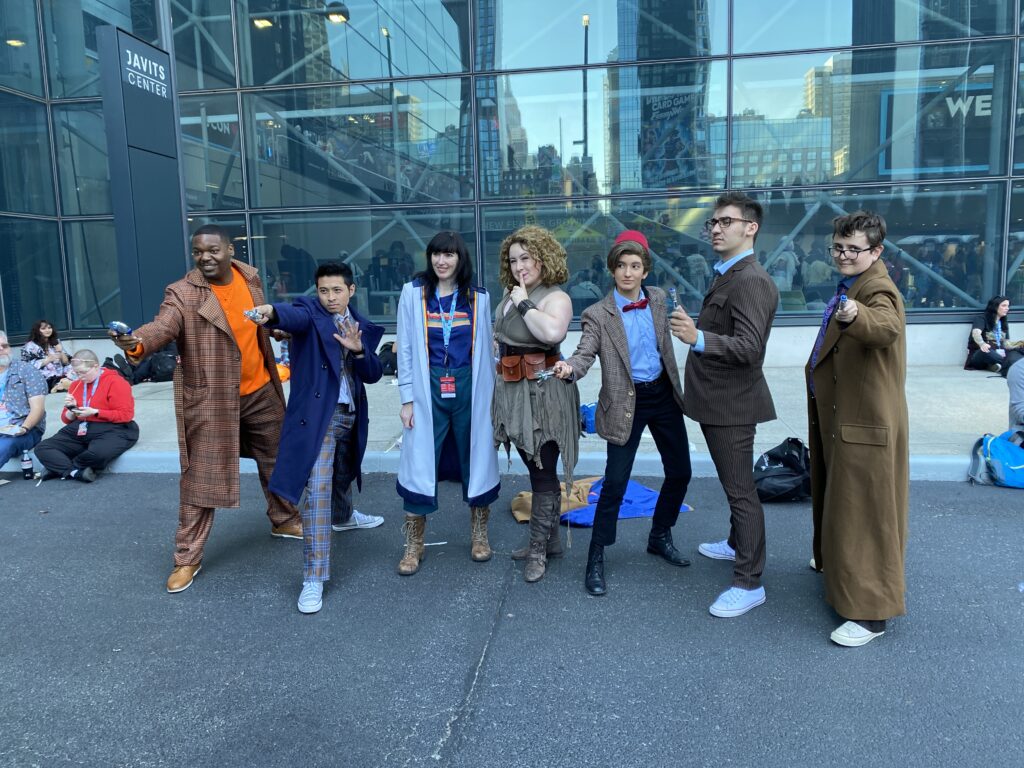 A group of Doctor Who cosplayers pose at NYCC 2024