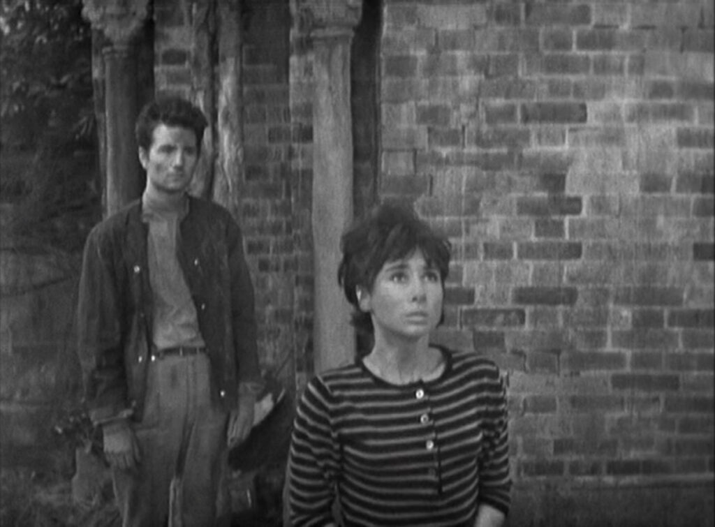 A slightly-disheveled Susan and David listen to the Doctor's goodbye message