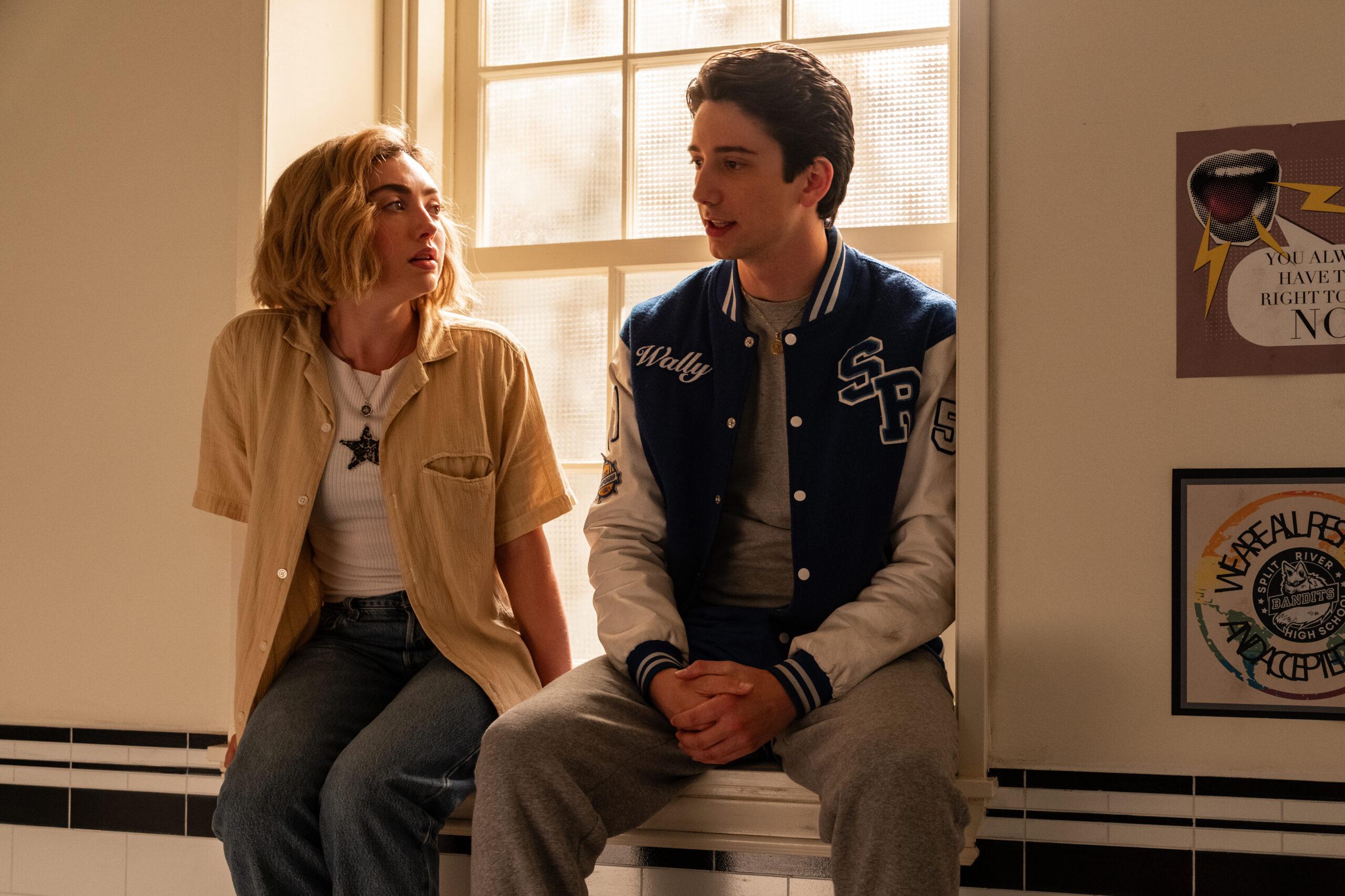 Maddie and Wally talk in the bathroom as he comforts her.