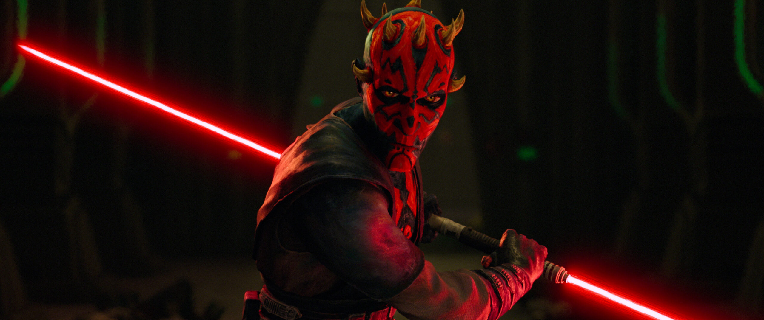 Maul in a prepared position with his lightsaber drawn.